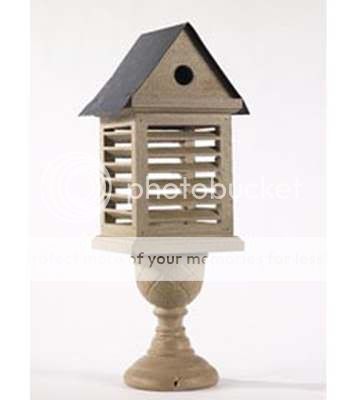 tan shutter birdhouse on pedestal base wood shutter black tin roof 