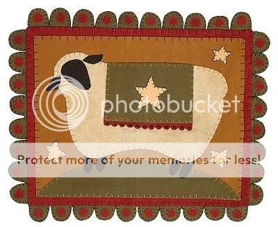 sheep stars are featured on this felt penny table mat that will be a 